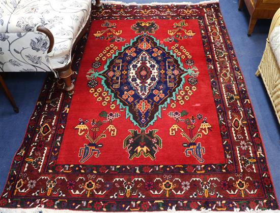 A Persian rug, 214 x 154cm